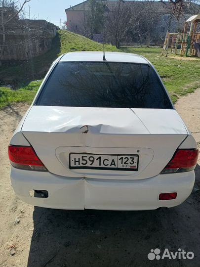 Крышка багажника Митсубиси Lancer 9