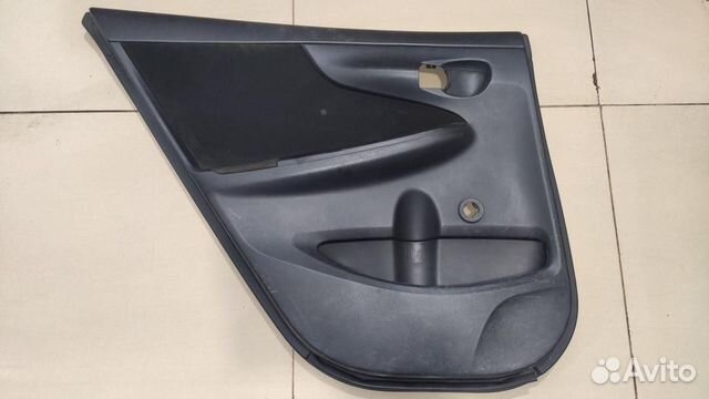 Обшивка двери задней левой Toyota Corolla