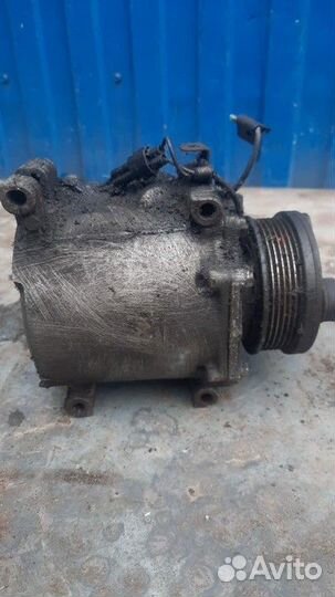 Компрессор кондиционера Mitsubishi Lancer