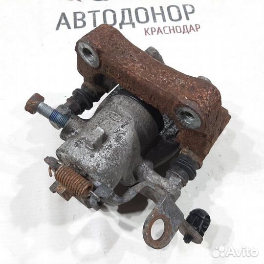 Суппорт тормозной задний правый Peugeot Partner L1