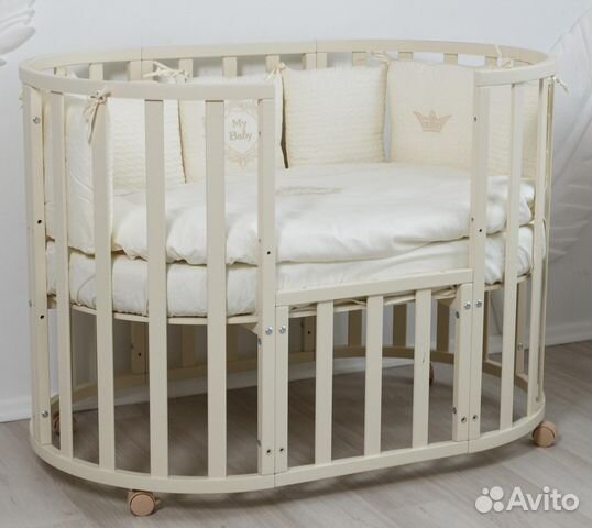 Детская кроватка с маятником круглая