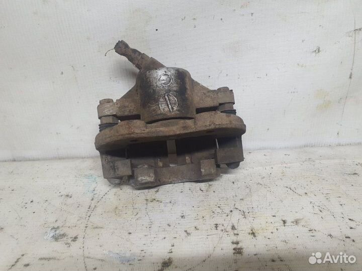 Суппорт тормозной передний левый Ваз Ока