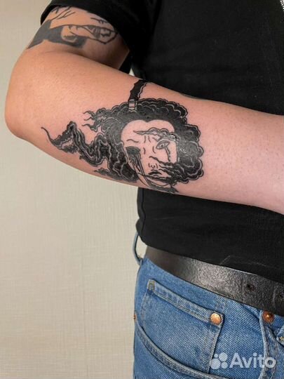 Тату-мастер