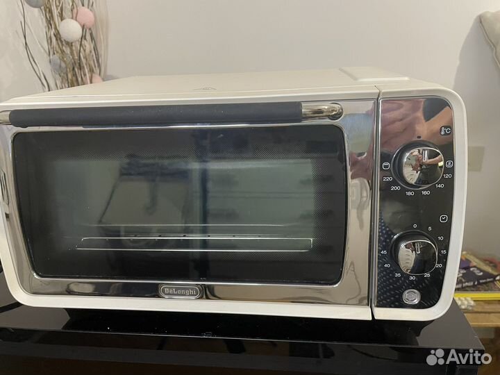Мини-печь DeLonghi новая