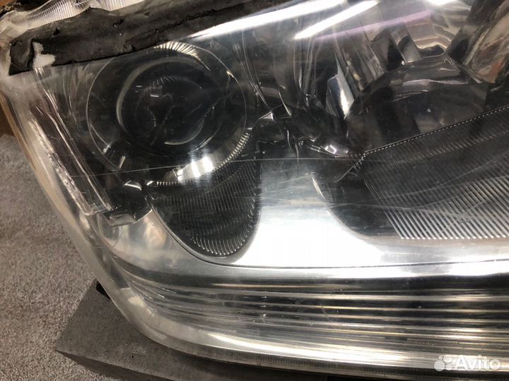 Стекло фары правой Suzuki Grand Vitara 05-15