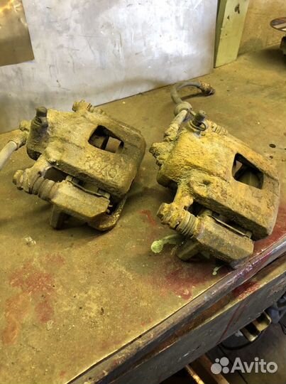 Суппорт правый передний Chevrolet Aveo T255