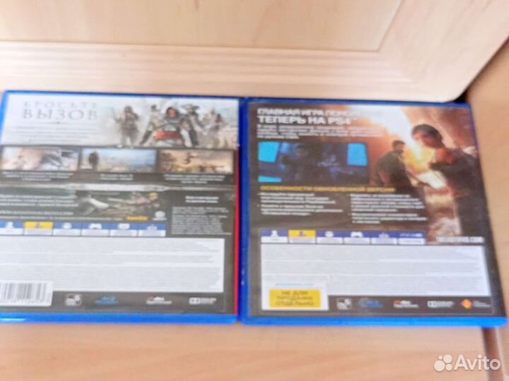 Два диска на ps4 assassin и the last of us