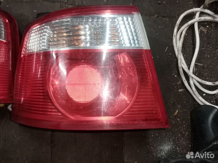 Фонарь внешний левый на Киа Каренс 2004 год