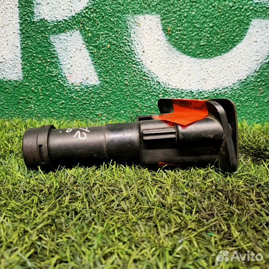 Форсунка омывателя фары правая Nissan Primera P12