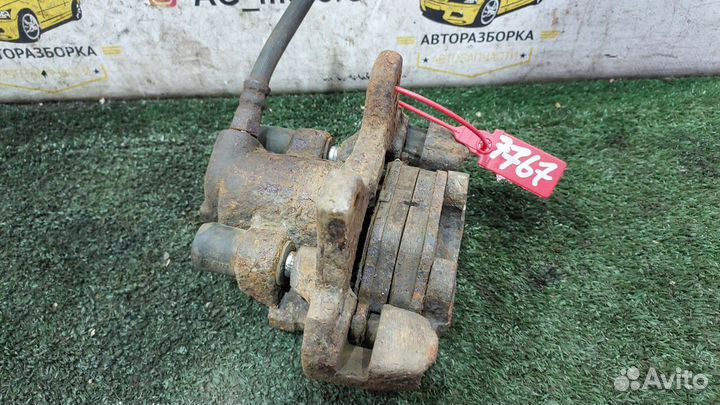 Суппорт тормозной задний левый BMW E34