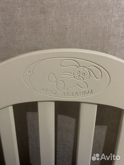 Детская кроватка с маятником