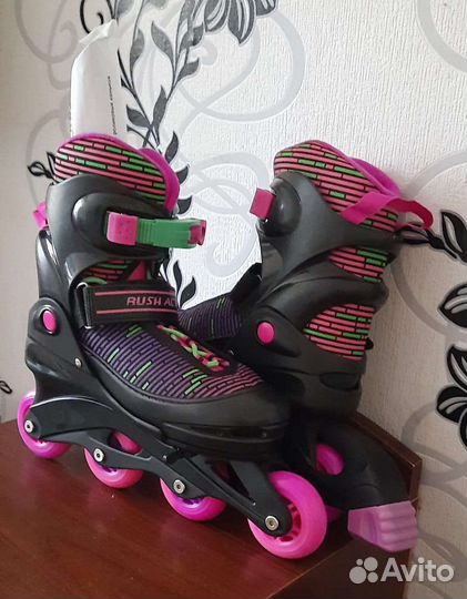 Роликовые коньки