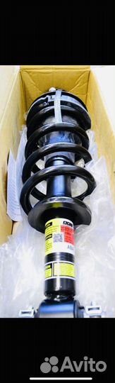 Амортизатор передний Cadillac Escalade 4 в сборе