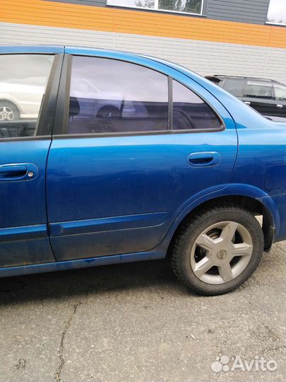 Дверь задняя левая Nissan Almera