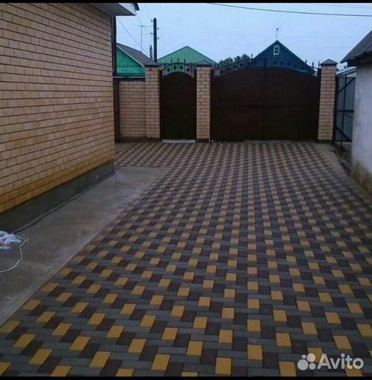 Укладка тротуарной плитки брусчатки