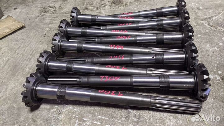 Вал вертикальный переднего моста мтз