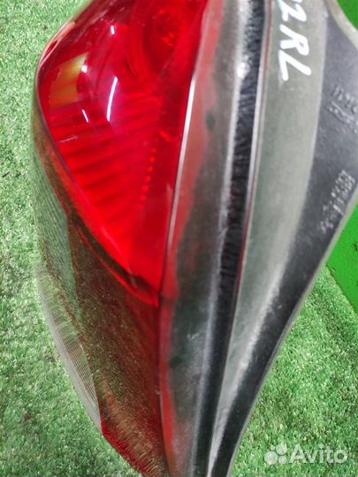 Фонарь задний наружный левый Toyota Yaris P90 2010