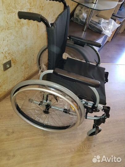 Инвалидная коляска новая