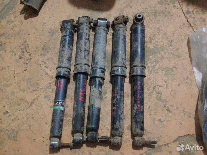 Задний амортизатор Renault Megan 2