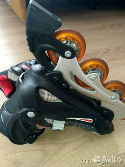 Роликовые коньки