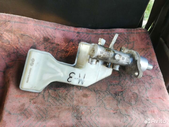 Главный тормозной цилиндр Мазда 3 вк