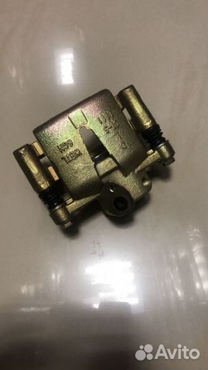 Суппорт тормозной Chery Tiggo задний левый 2WD (Ch