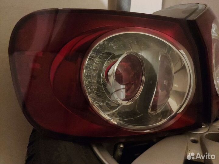 Задний левый фонарь VW Golf Plus