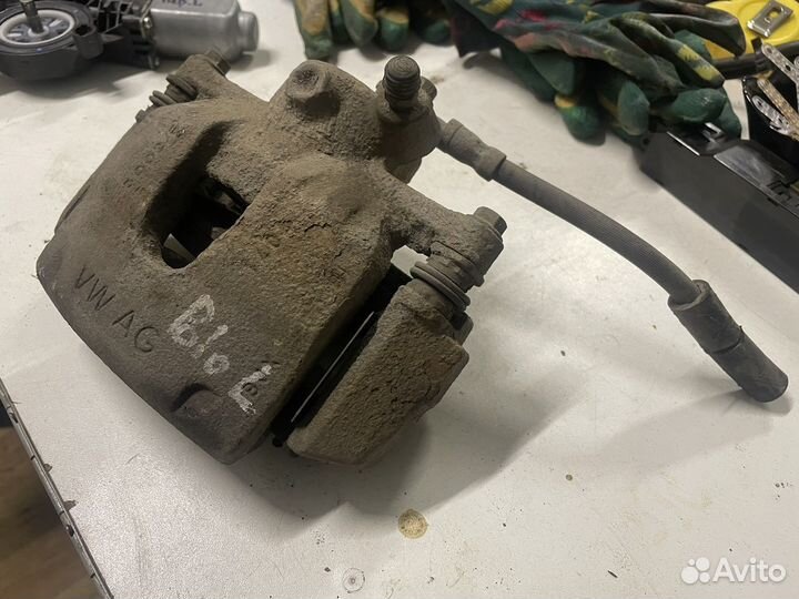 Суппорт передний левый Volkswagen Polo 11-2020