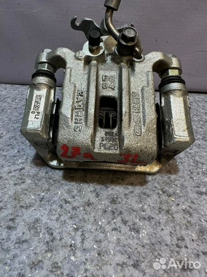 Суппорт задний левый Kia Seltos SP2 1.6 G4FG МКПП