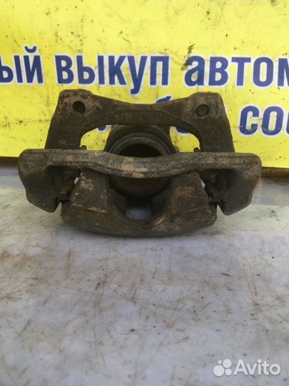 Суппорт тормозной передний правый Nissan Almera