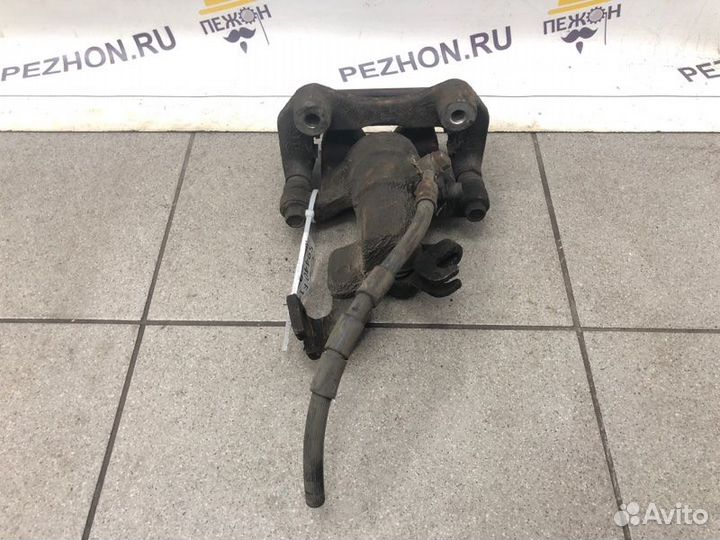 Суппорт тормозной задний левый Mazda Mazda6