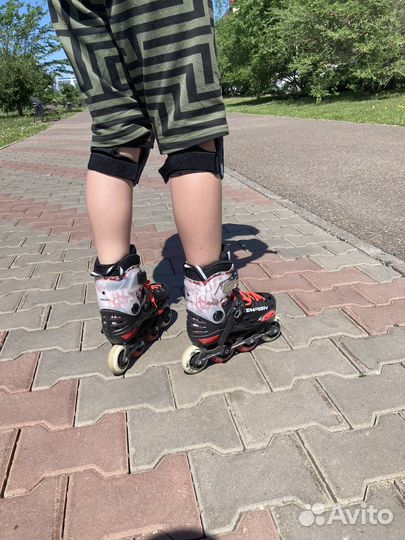 Роликовые коньки