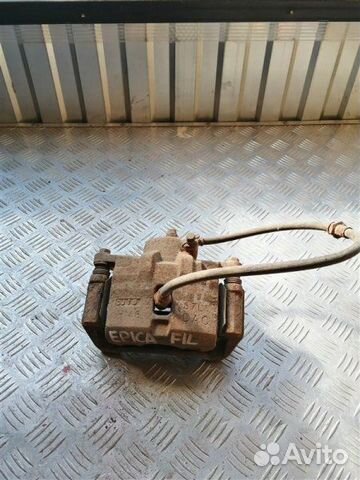 Суппорт тормозной передний левый Chevrolet Epica