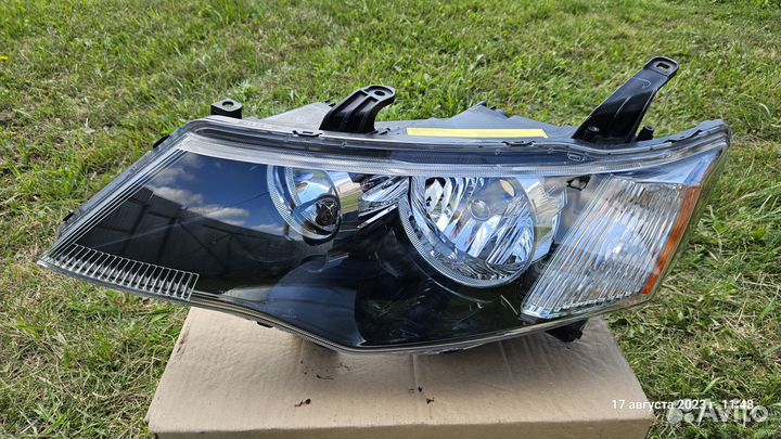Фара левая Mitsubishi Outlander 2 XL (2005-2009)
