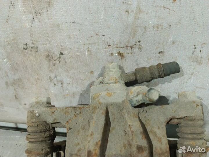 Суппорт тормозной задний правый Chevrolet Lacetti