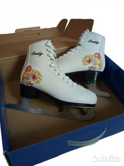 Фигурные коньки белые