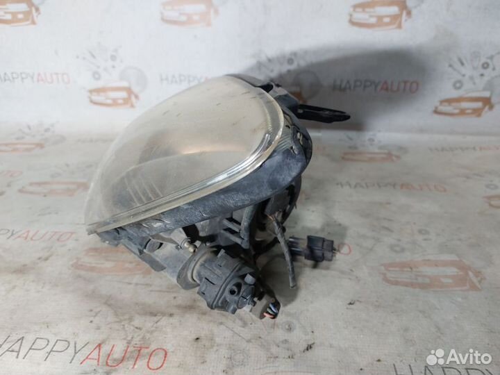 Фара левая Mitsubishi Lancer 9