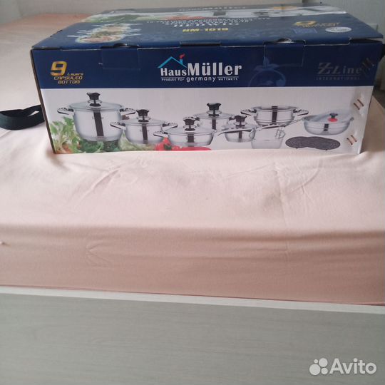 Новый набор кастрюль (Германия)