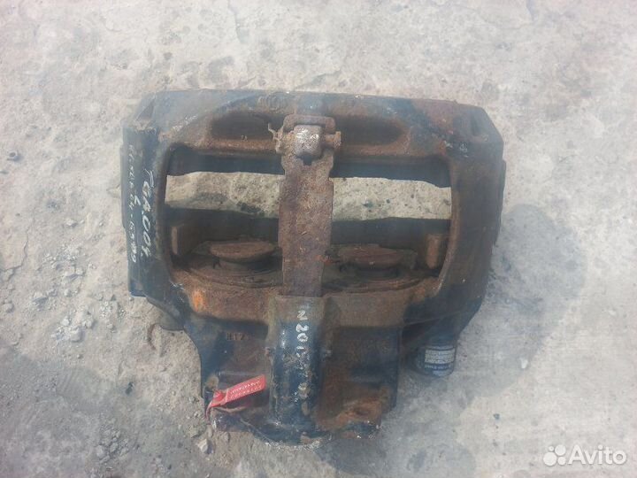 Суппорт тормозной передний левый Man Tga 2000-2020