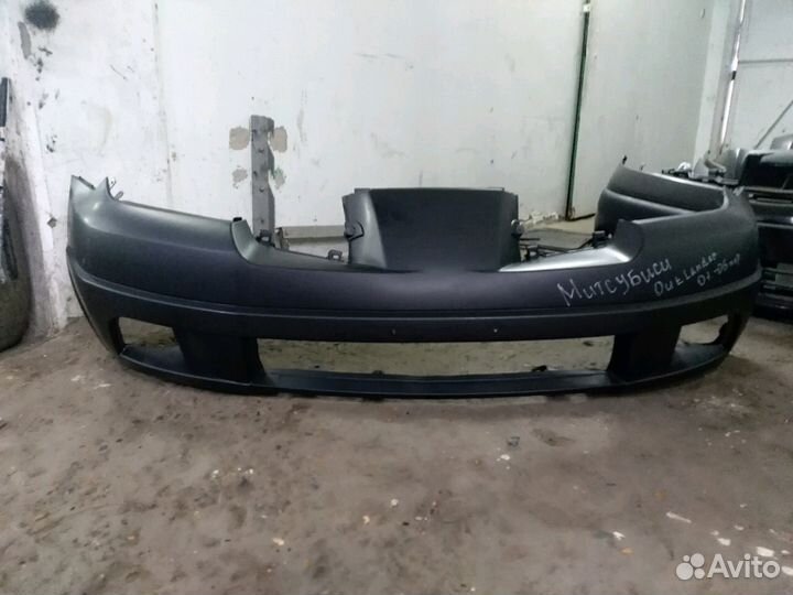 Бампер на Митсубиси Аутлендер 01-06г