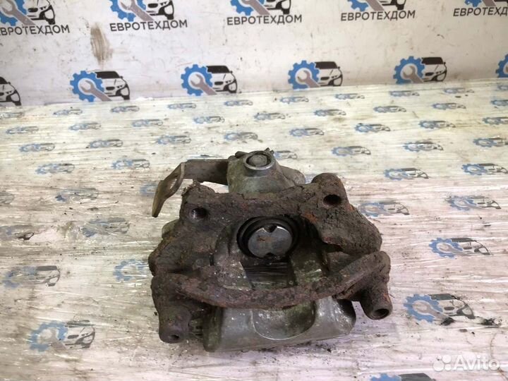 Суппорт передний левый Opel Astra G универсал