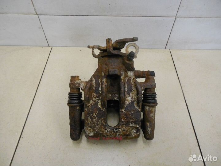 Суппорт задний левый Focus I 1998-2004