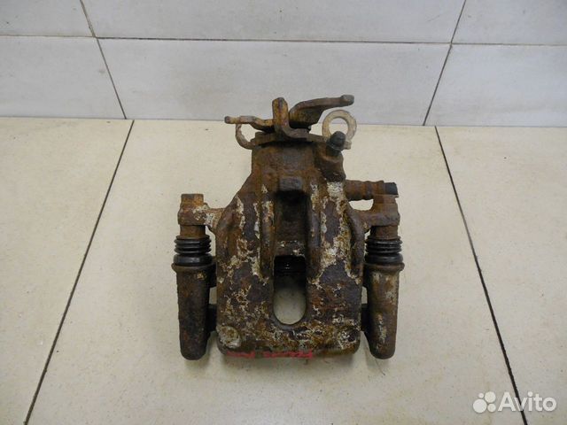 Суппорт задний левый Focus I 1998-2004