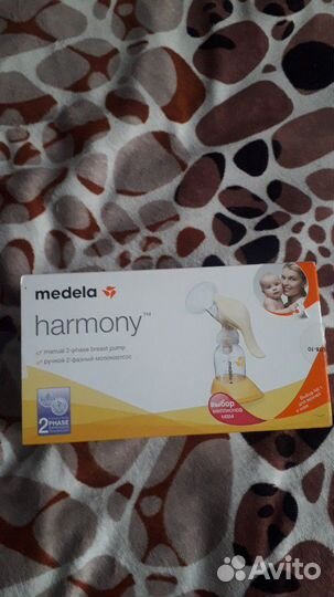 Молокоотсос medela