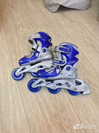 Роликовые коньки