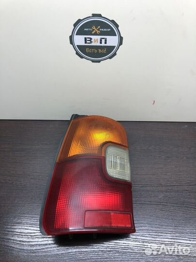 Задний фонарь левый Toyota Corolla 100 универсал