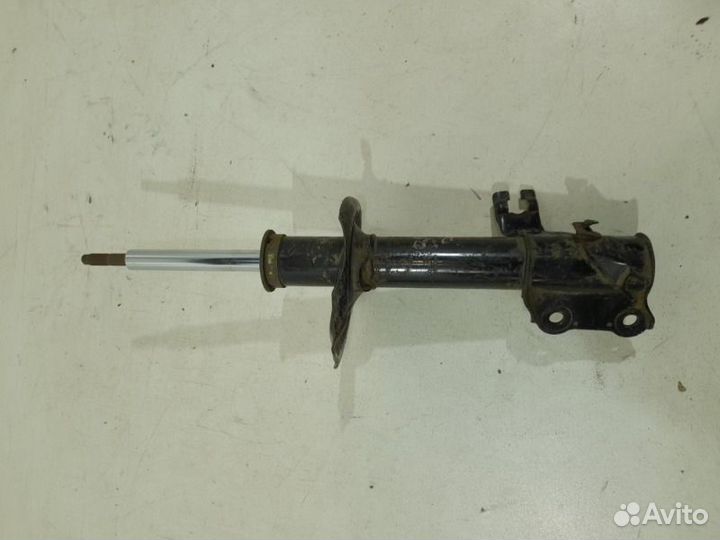 Амортизатор передний левый Nissan Almera Classic