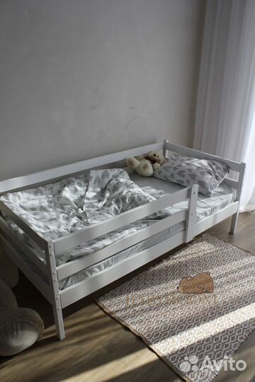 Детская кровать с бортом