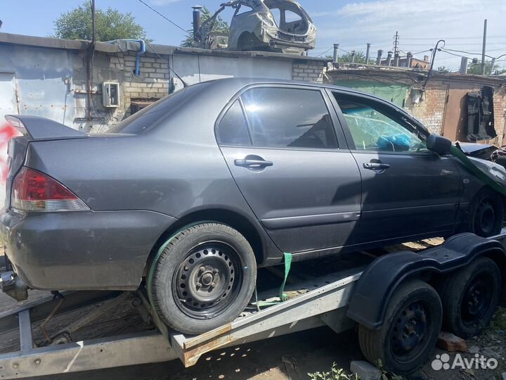 Разбор б/у запчасти Mitsubishi Lancer 9 (2003-2008