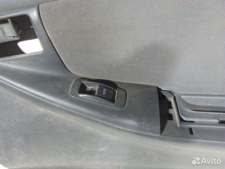 Обшивка двери задняя правая Toyota Corolla 120